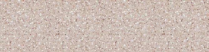 Terrazzo clair piqueté d’éclats bruns, rouille et gris répartis régulièrement