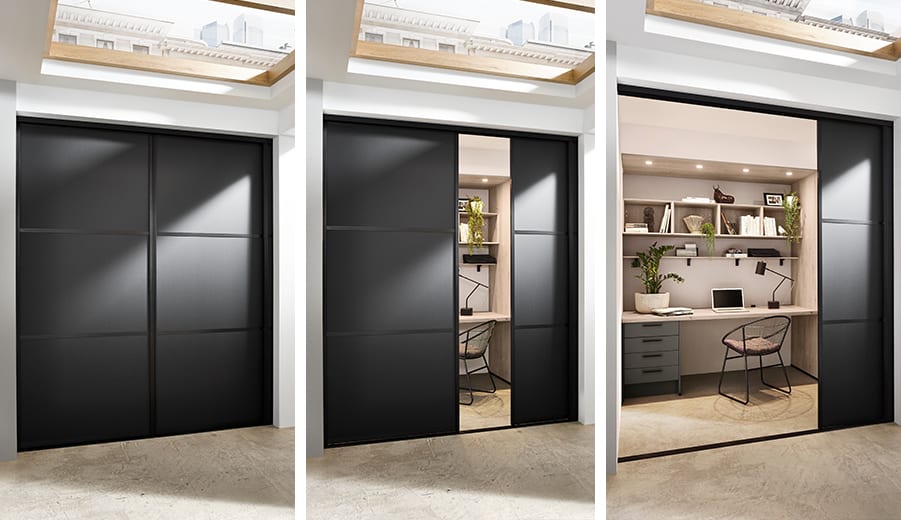 Open-plan office with bespoke storage, acoustic panels and a glazed meeting room